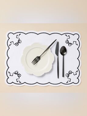 nwt set of 2 Anthropologie Benedita Black Bow Placemats